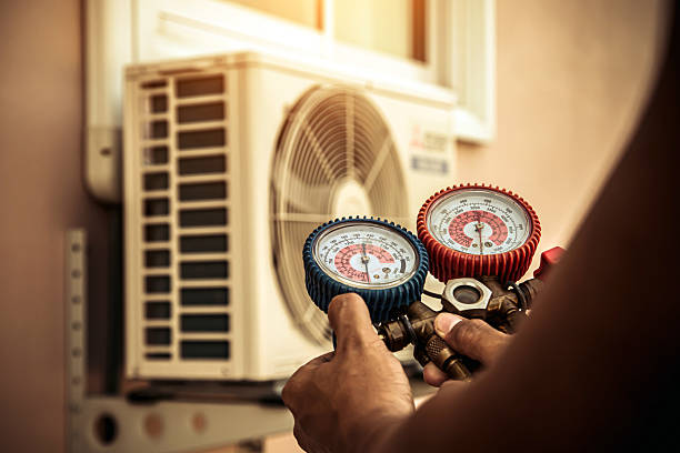 Professional Heat Pump Repair technician working in Afton, WY